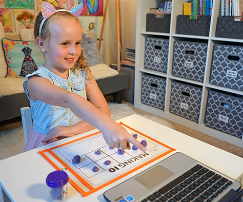 Girl interacting in online preschool classes